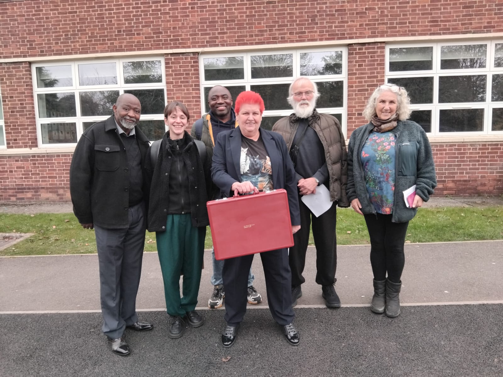 a group of people posing for a photo